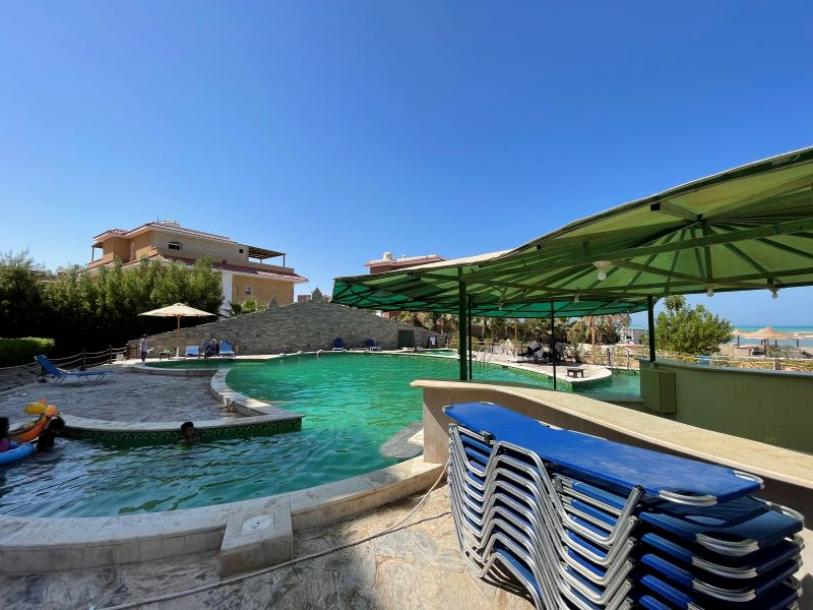 Nagelneue 2-Zimmer-Wohnung in grüner Oase mit privatem Strand-1